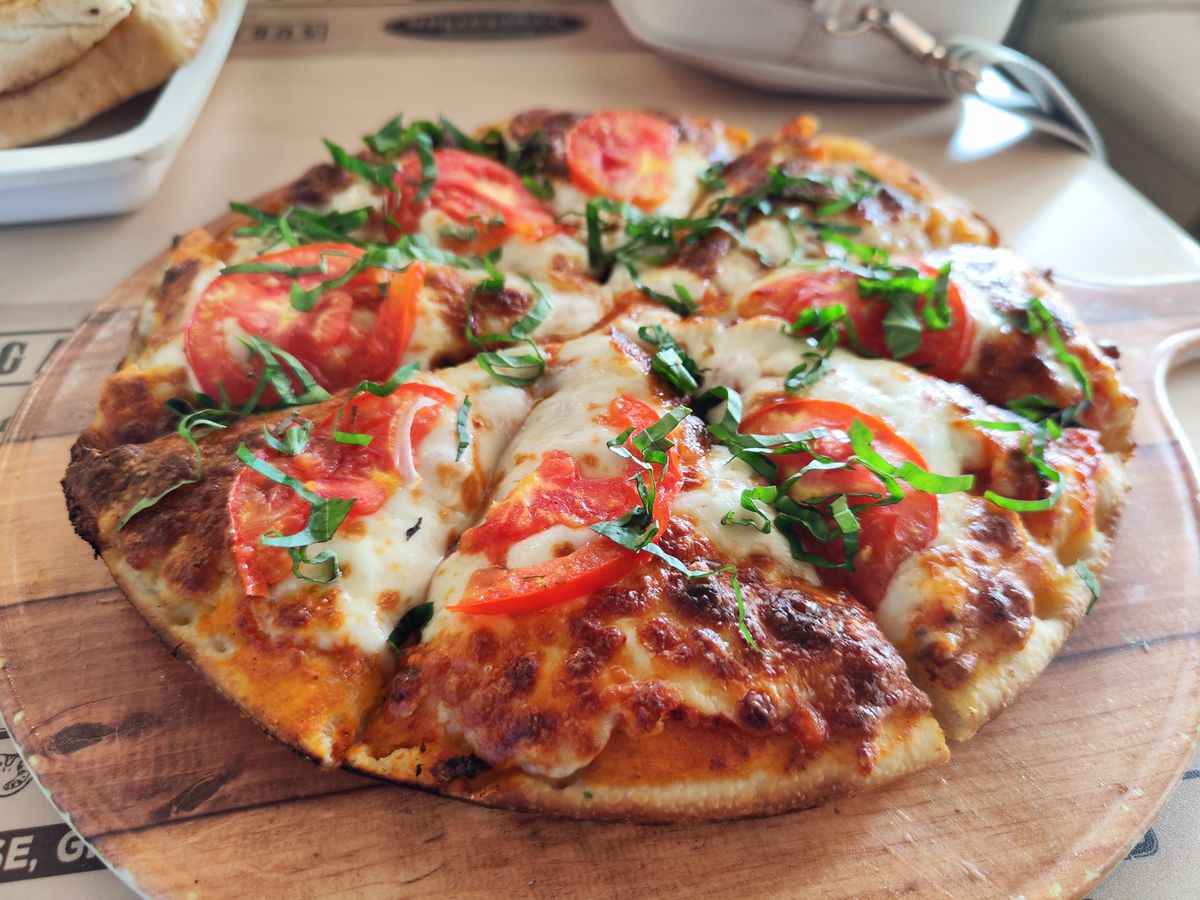 Pizza margherita no Parque Feliz